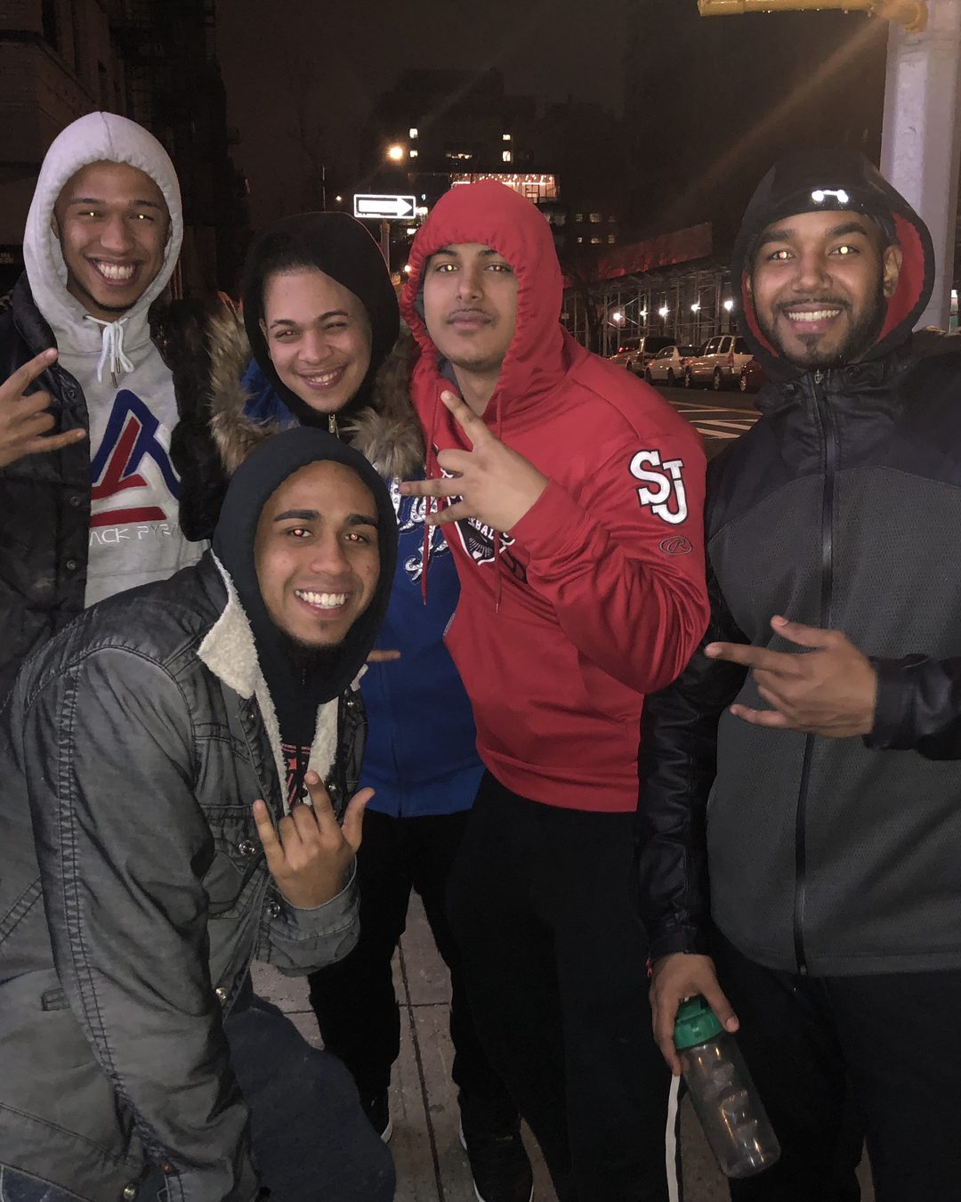 Neno with friends in St. John’s gear