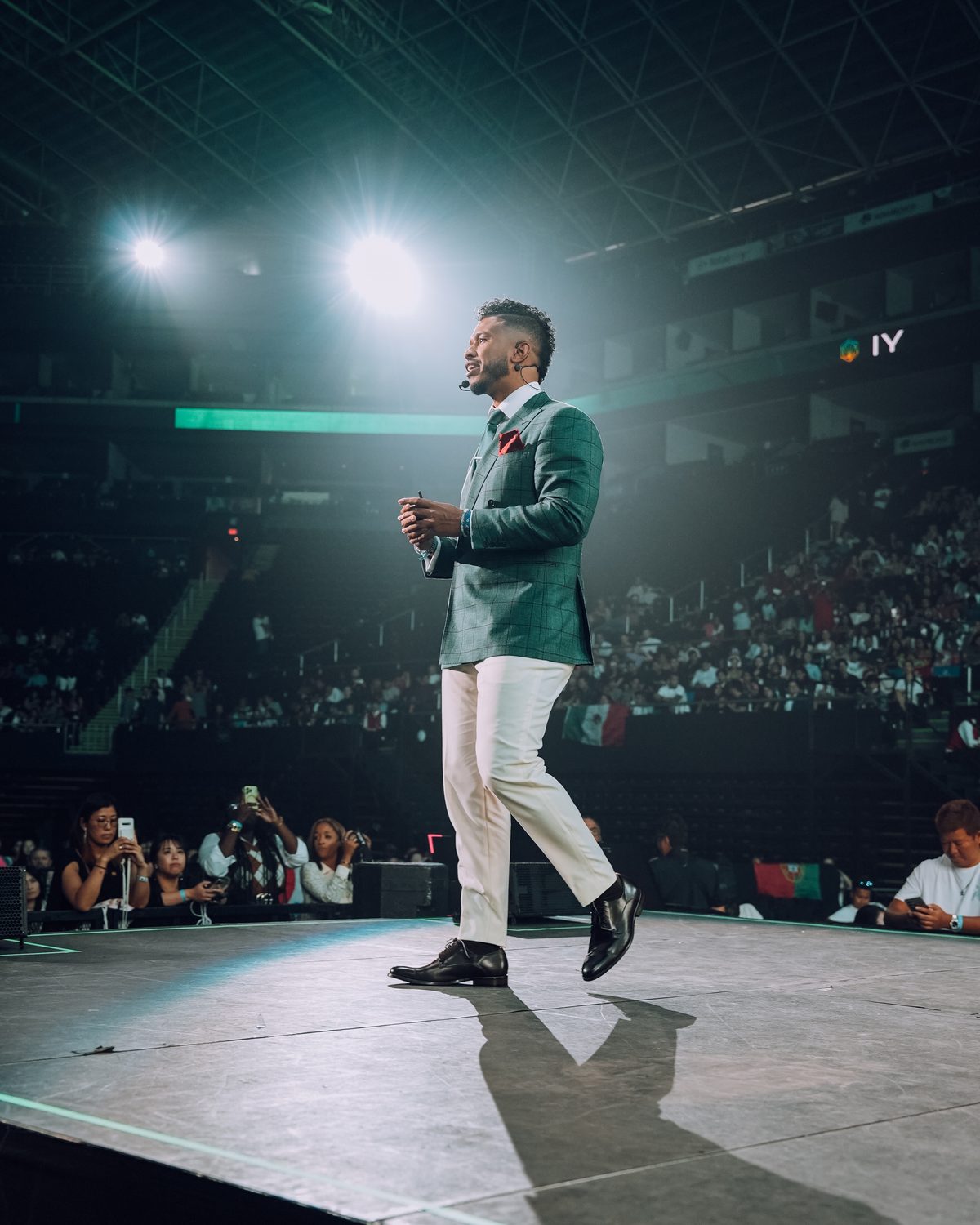 Neno on stage in an arena